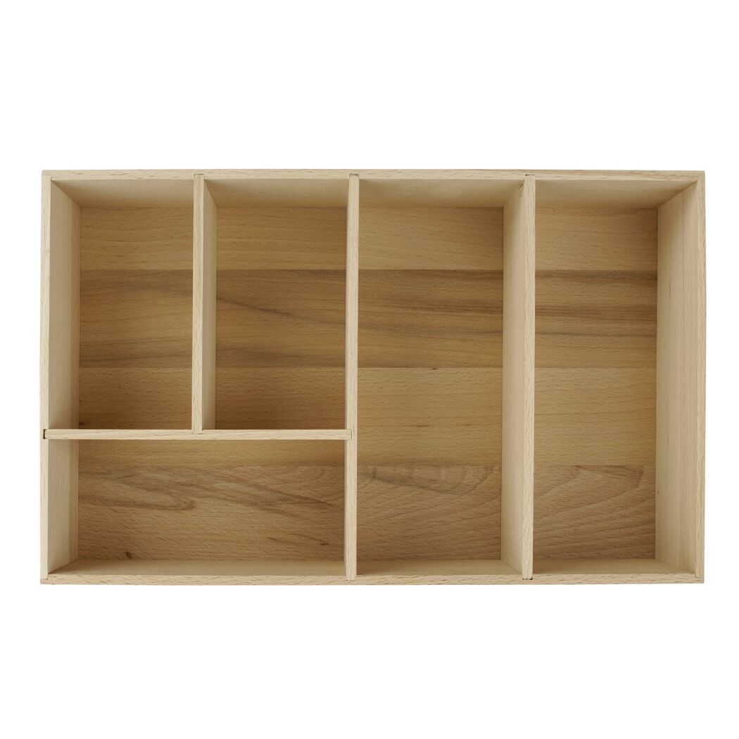 Leere Schubladenbox aus hellem Holz