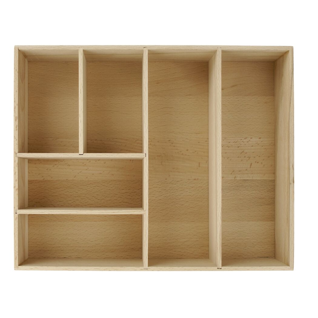 Leere Schubladenbox aus hellem Holz.