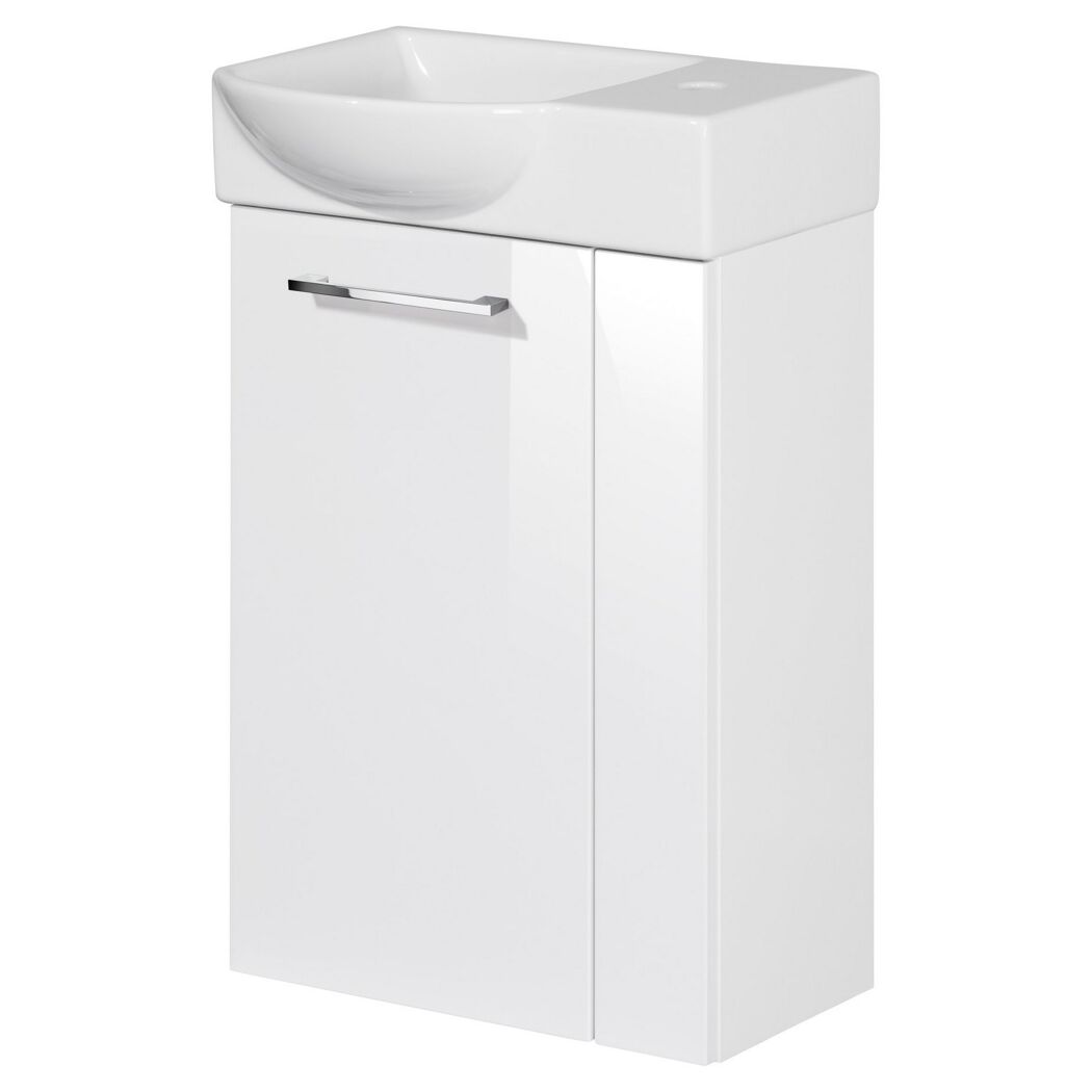 Weißer Waschbeckenunterschrank mit Waschbecken und Armatur.