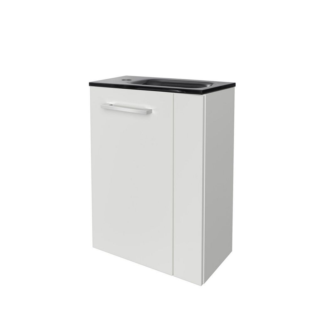 Weißer Waschbeckenunterschrank mit schwarzer Keramikplatte.