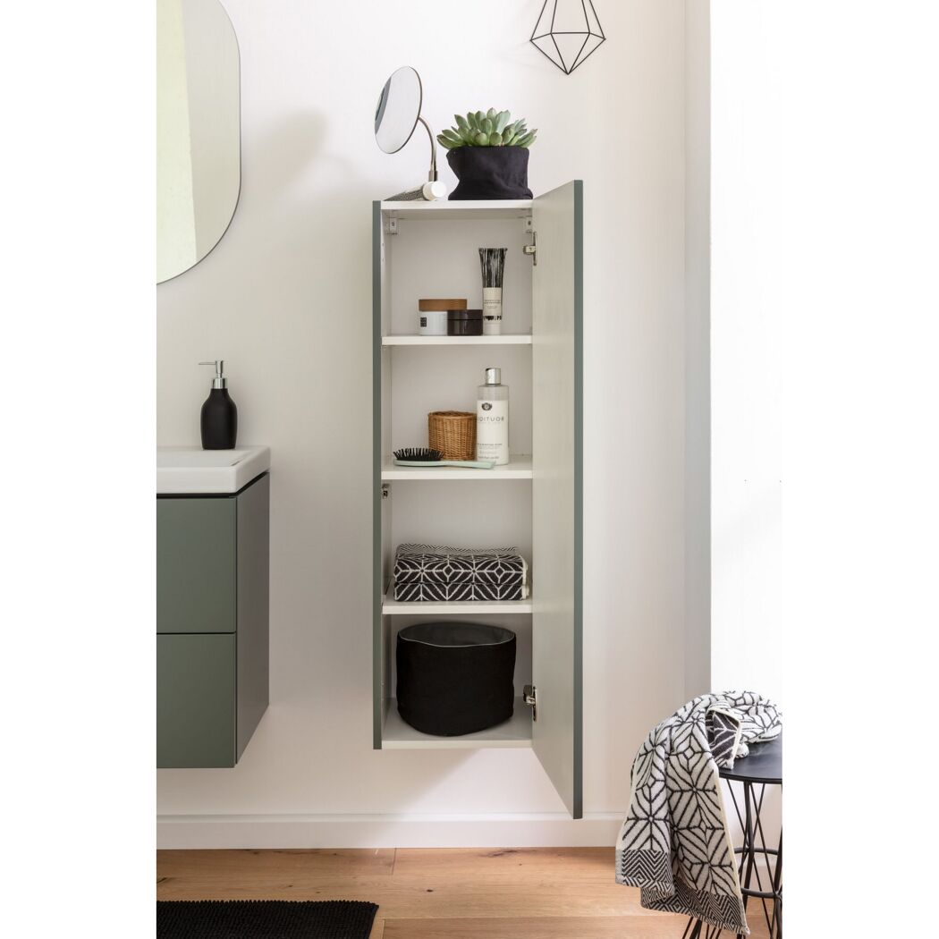 Grüner Midischrank CRAFT mit geöffneter Tür.