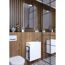 Modernes Badezimmer mit weißem Waschbeckenunterschrank und Holzwand.