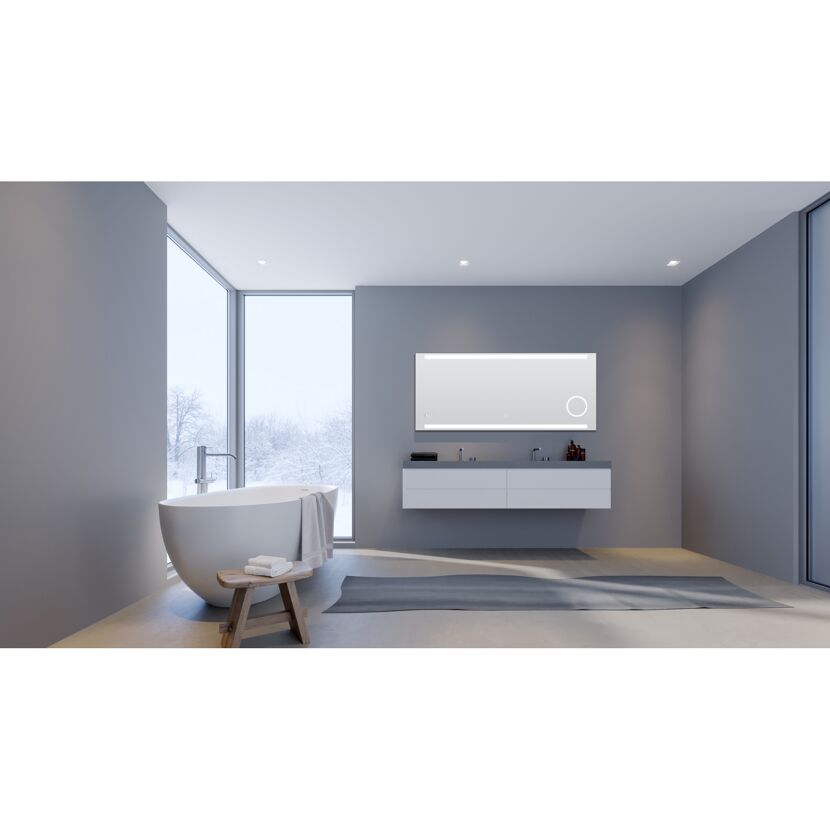 Modernes Badezimmer mit freistehender Badewanne und LED-Spiegel.