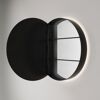 Runder, offener Spiegelschrank an Wand