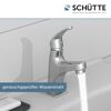 Wasserhahn mit laufendem Wasserstrahl
