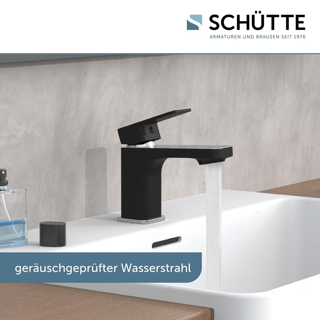 Schwarzer Wasserhahn mit laufendem Wasserstrahl