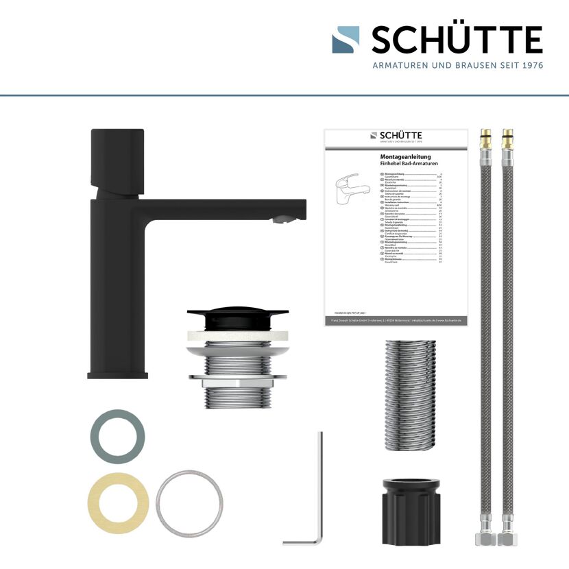 Einzelteile einer schwarzen Waschtischarmatur der Marke Schütte.