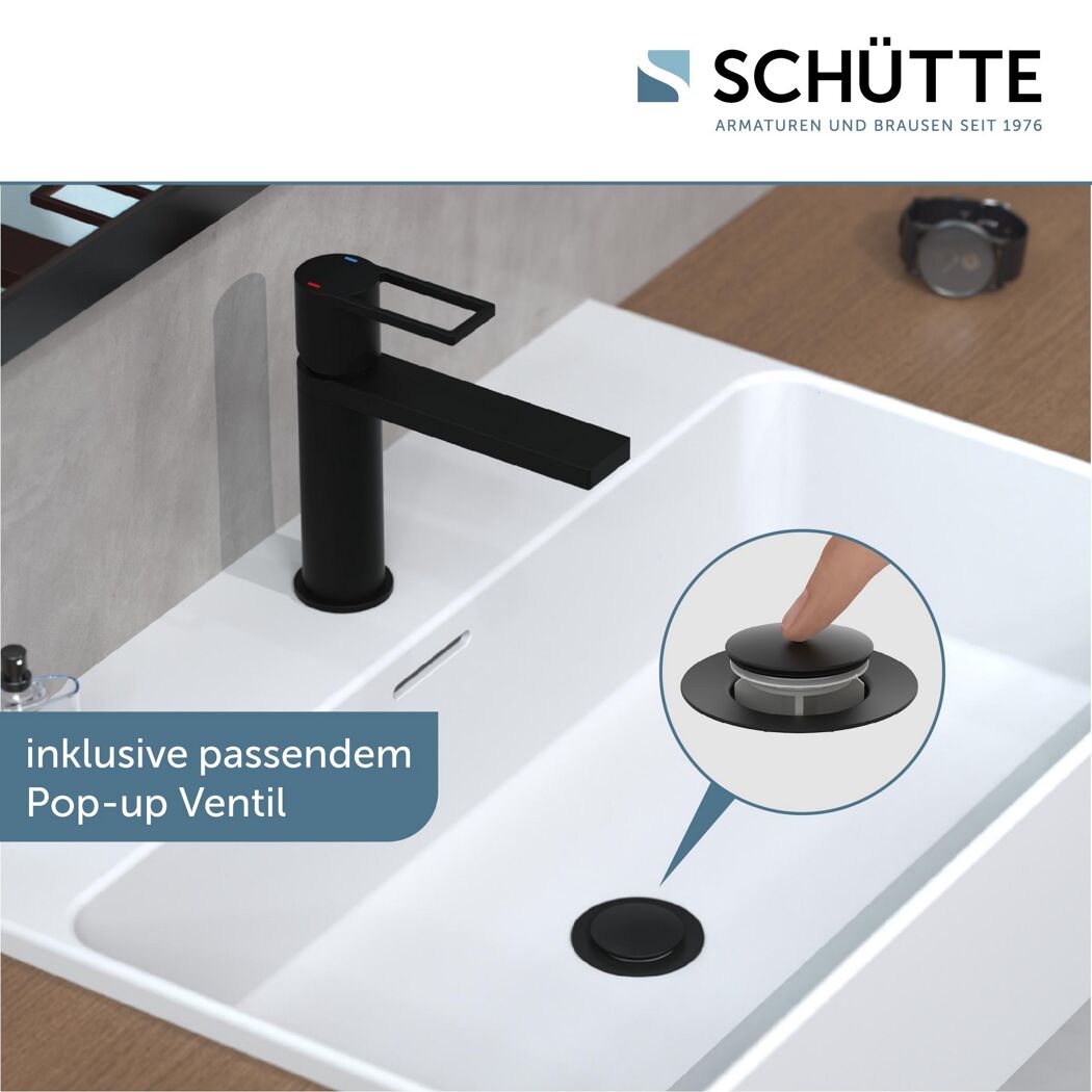Waschbecken mit schwarzer Armatur und Pop-up Ventil
