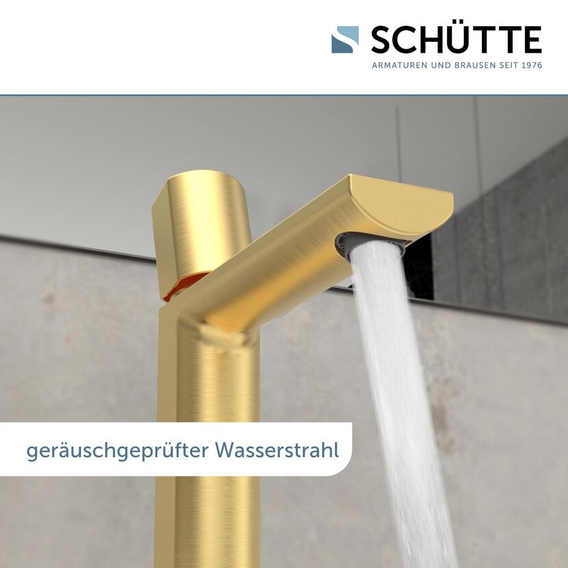 Goldener Waschtischarmatur mit laufendem Wasserstrahl