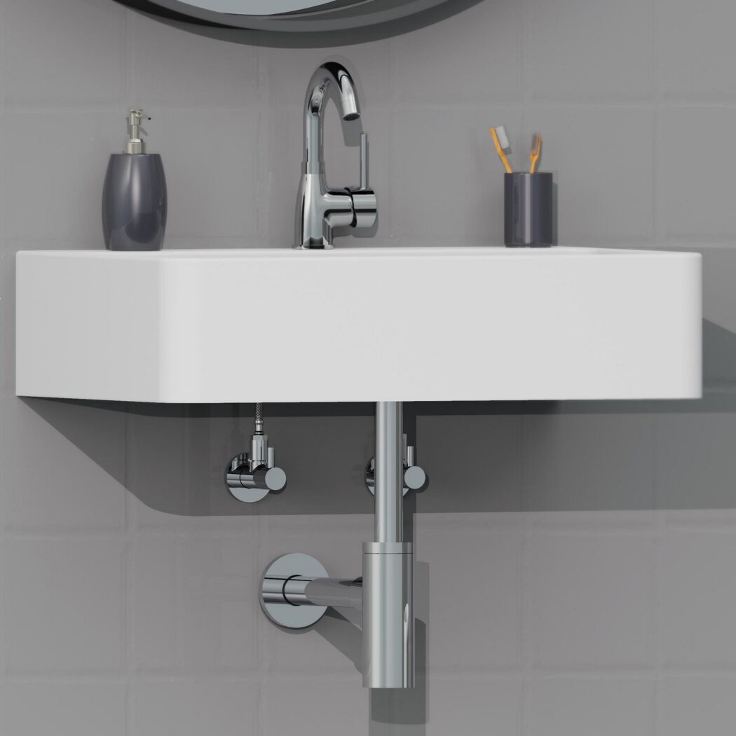 Waschbecken mit Seifenspender, Zahnbürsten und Wasserhahn.