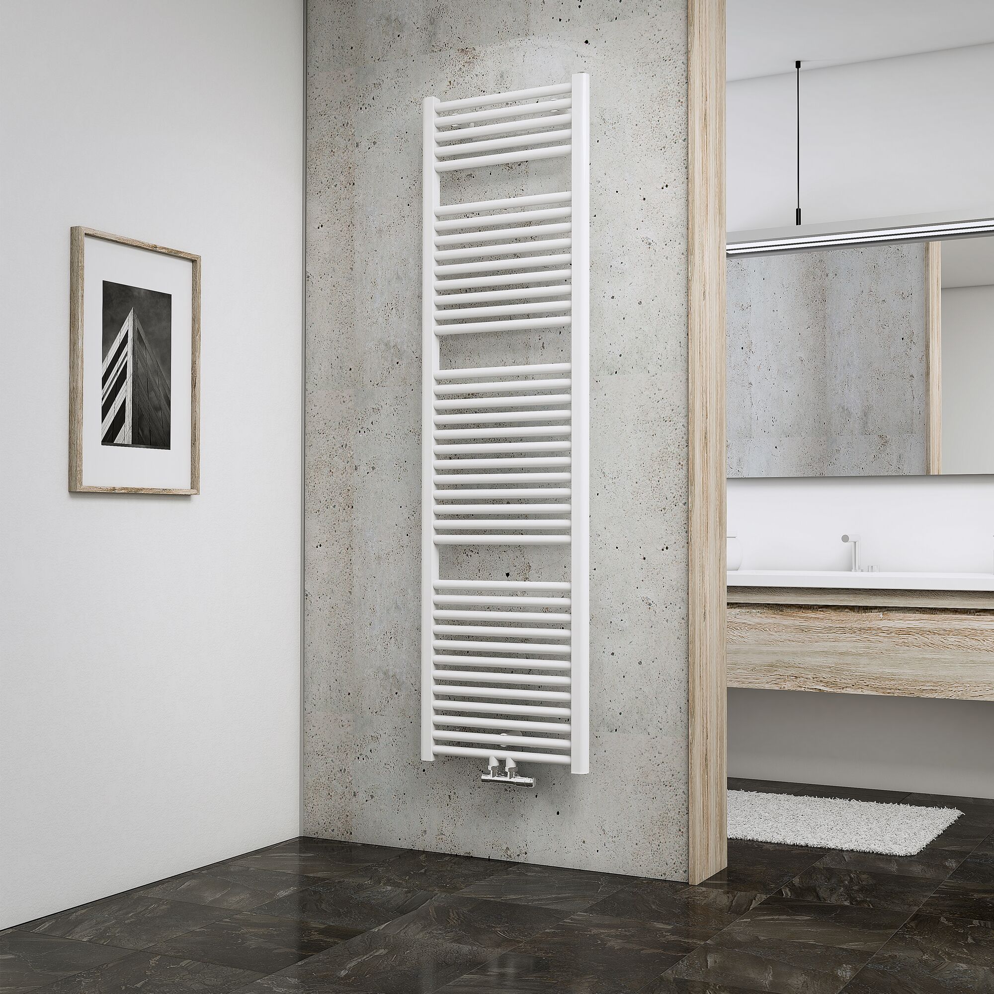 Weißer Handtuchheizkörper an Betonwand