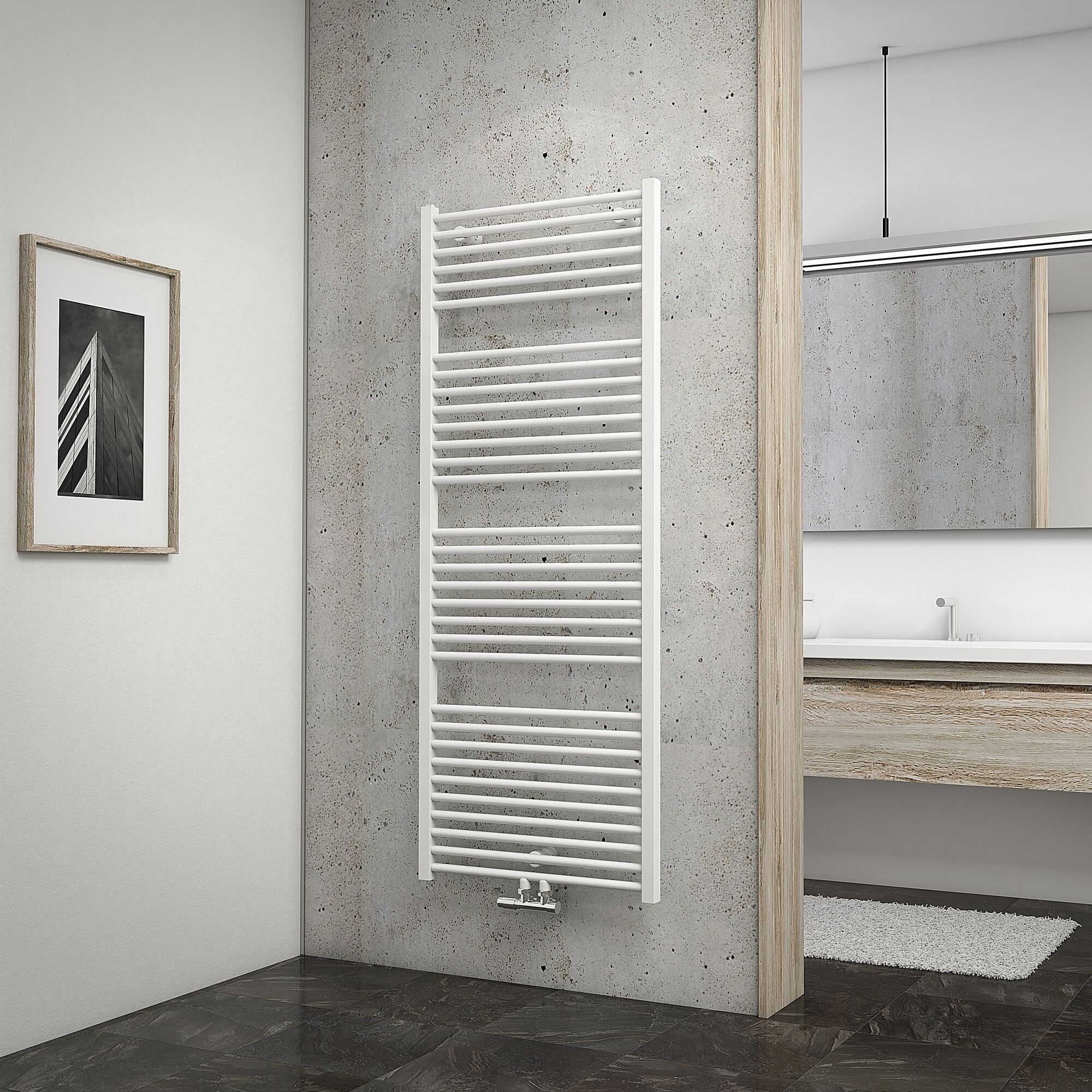 Weißer Handtuchheizkörper an Betonwand