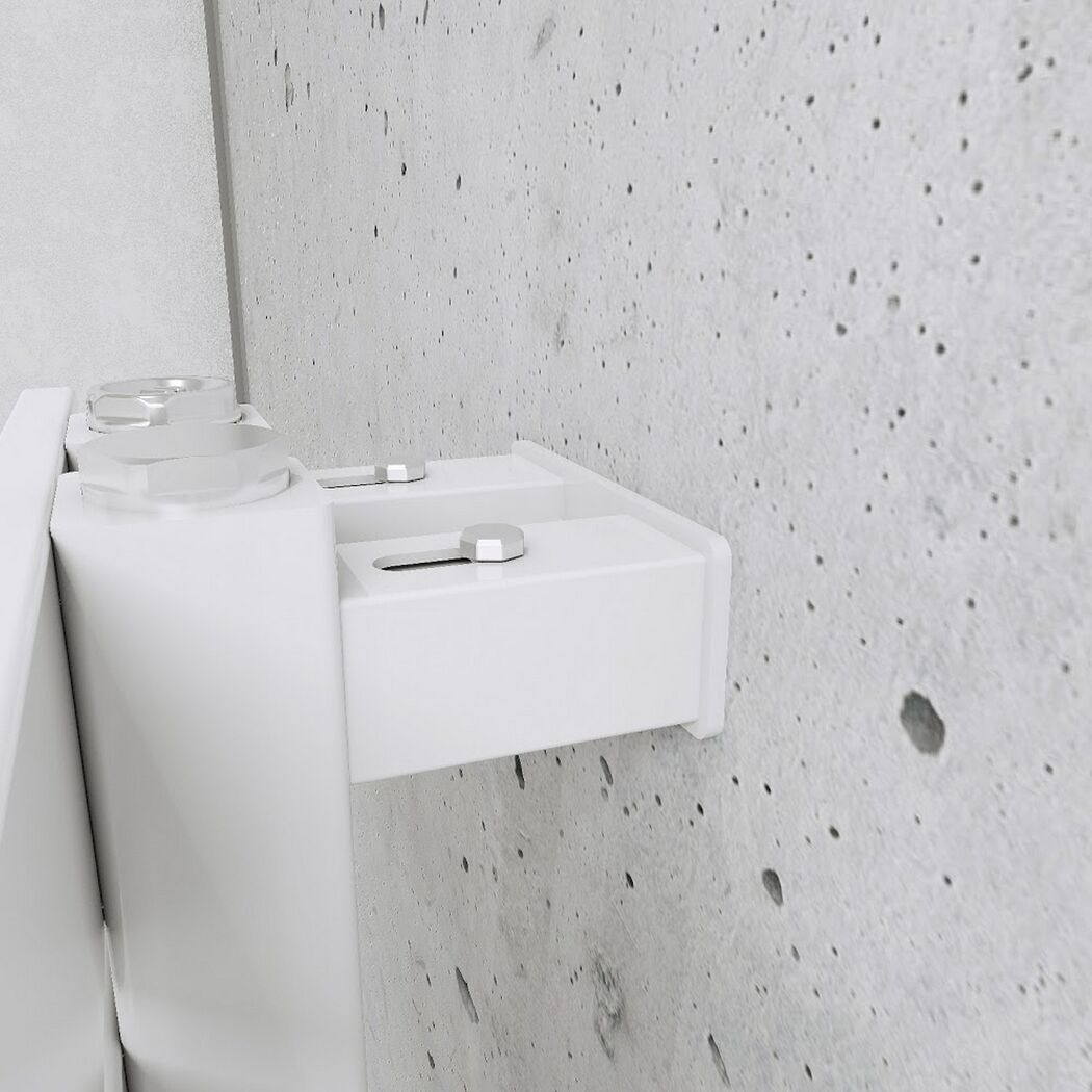 weiße Handtuchhalterung an Betonwand