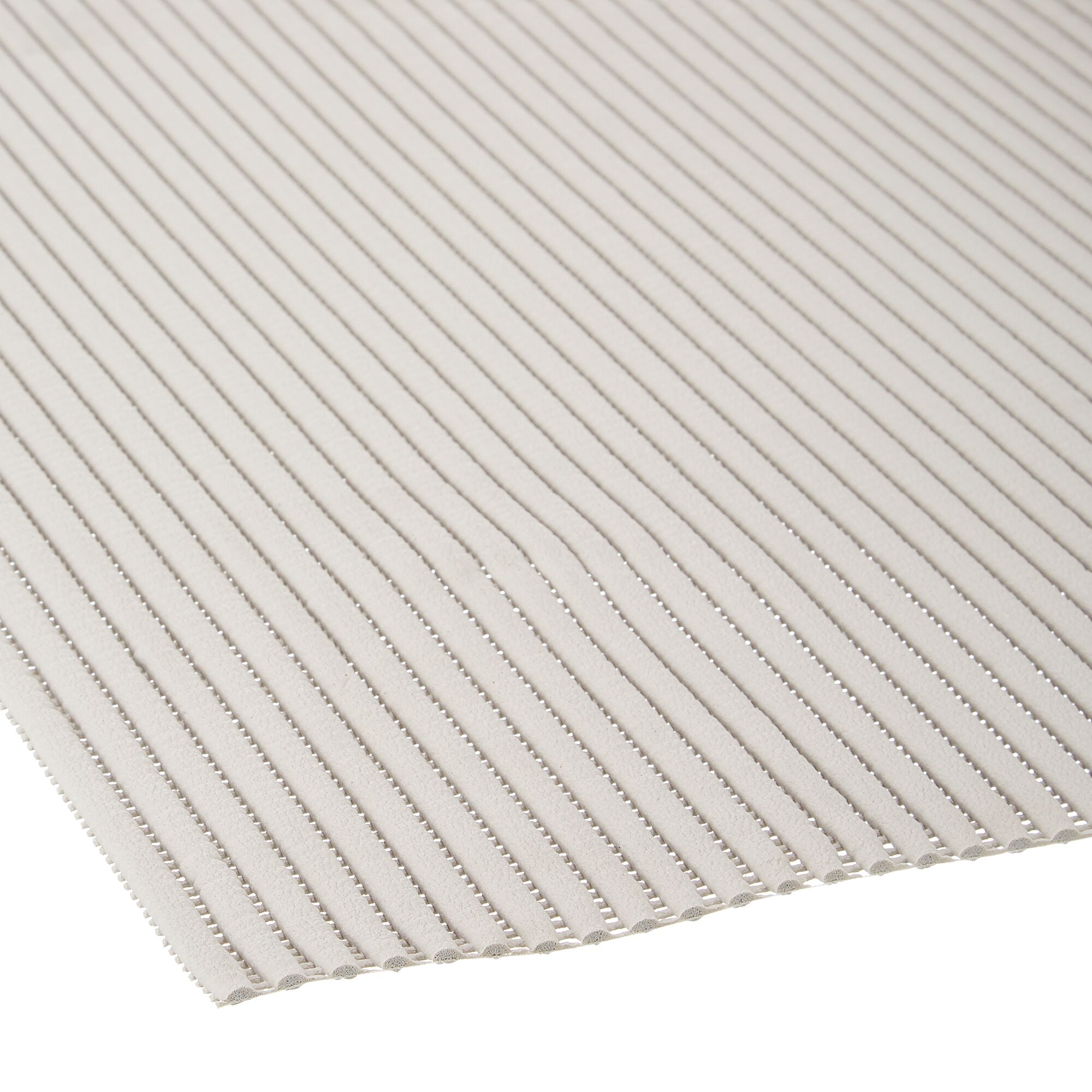 Graue Fußmatte mit Rillen