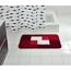 Roter Badteppich mit weißem Muster
