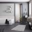 Badezimmer mit grauem Badvorleger