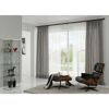 Modern eingerichtetes Wohnzimmer mit Lounge-Sessel