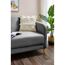 Beiges Kissen Inessa auf grauem Sofa