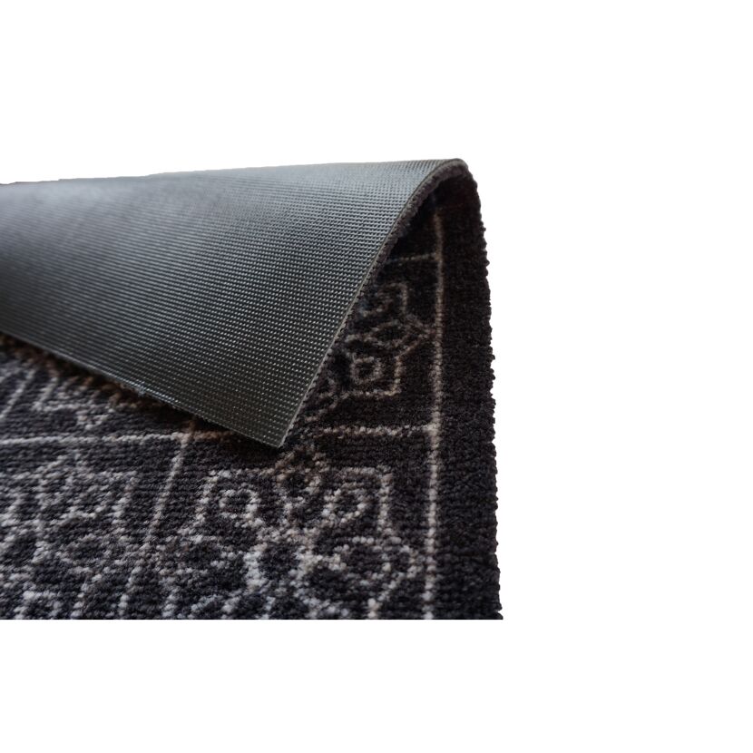 Schwarze Schmutzfangmatte mit grauen Ornamenten, Nahaufnahme