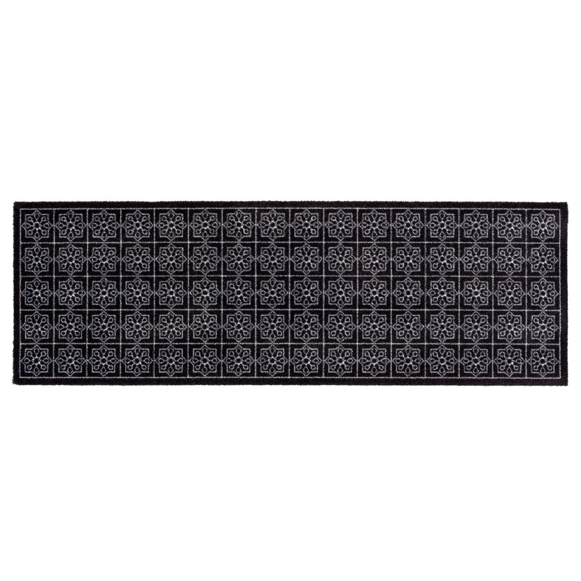 Schwarze Schmutzfangmatte mit hellem Muster