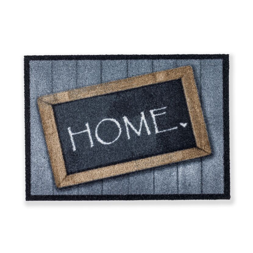 Fußmatte mit "HOME"-Schriftzug.