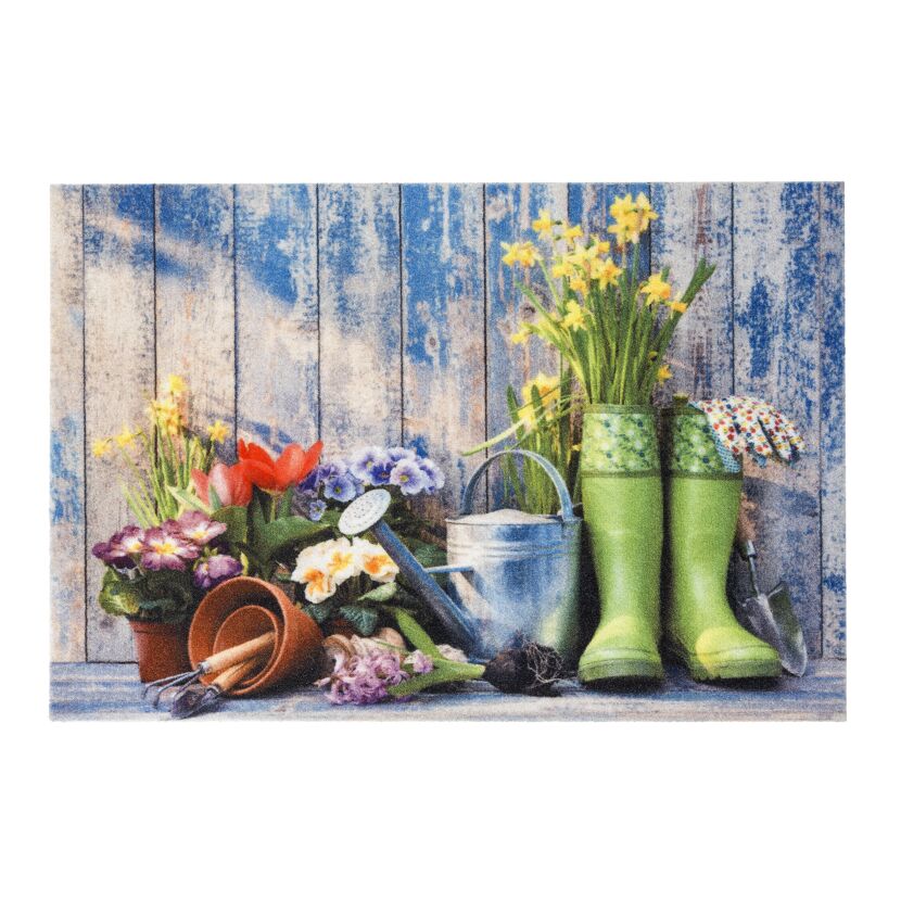 Fussmatte mit Gartenwerkzeug und Blumen