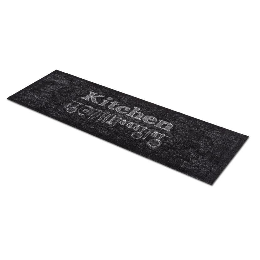 Schwarze Fußmatte mit der Aufschrift "Kitchen"