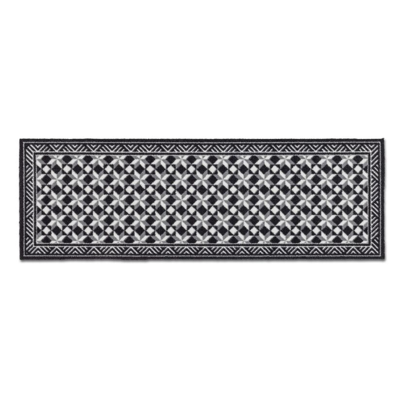 Schwarze und graue Schmutzfangmatte mit geometrischem Muster