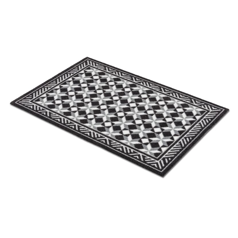 Schwarze und graue Schmutzfangmatte mit geometrischem Muster.