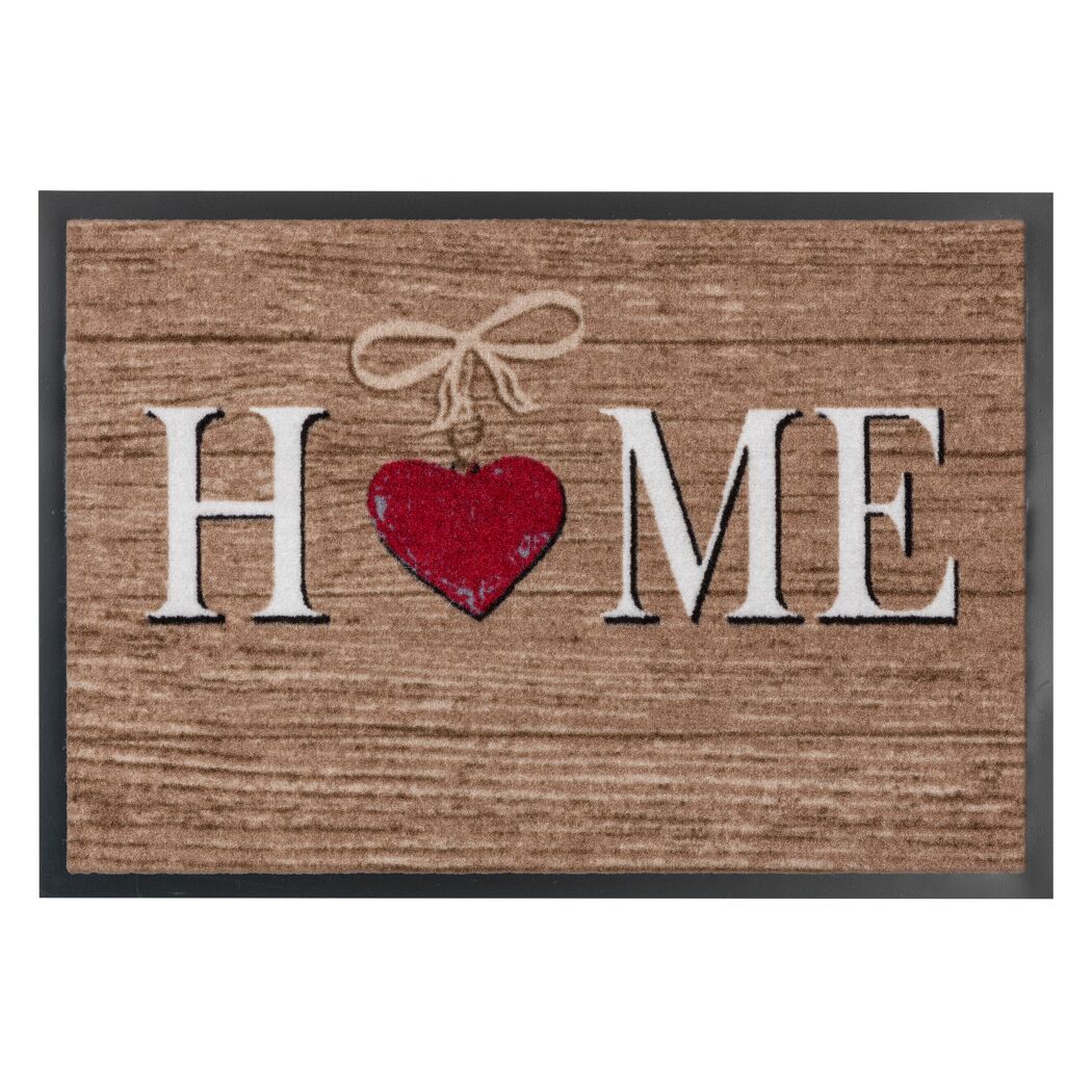Fußmatte mit der Aufschrift 'HOME' und einem Herz