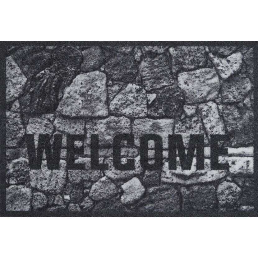 Schwarze Fußmatte mit Steindesign und "Welcome" Schriftzug.