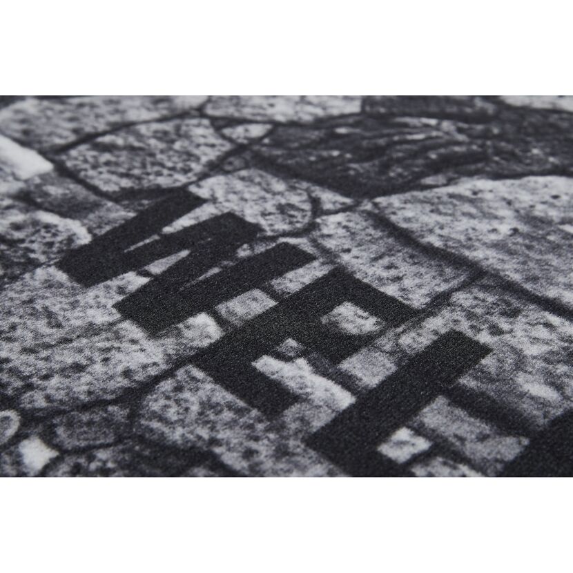 Schwarze Fußmatte Welcome Stone, Nahaufnahme
