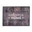 Fußmatte mit "Welcome Home" Schriftzug.
