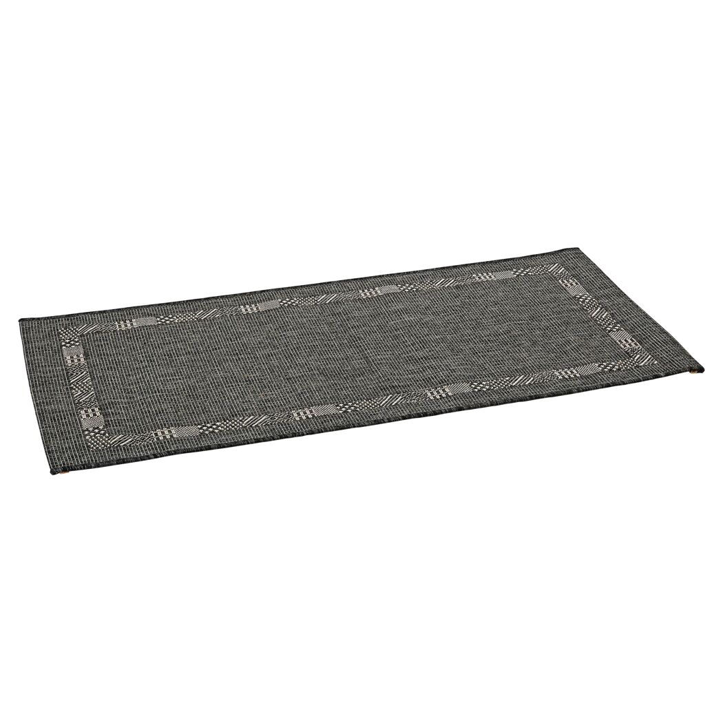Anthrazitfarbener Teppich Montana mit geometrischem Muster am Rand.