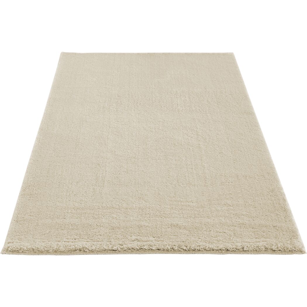 Cremefarbener Teppich