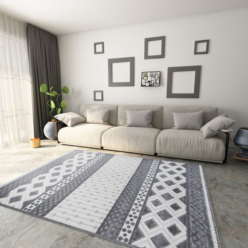 Wohnzimmer mit grau-weißem Teppich