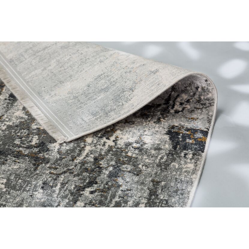 Grauer Teppich mit Muster