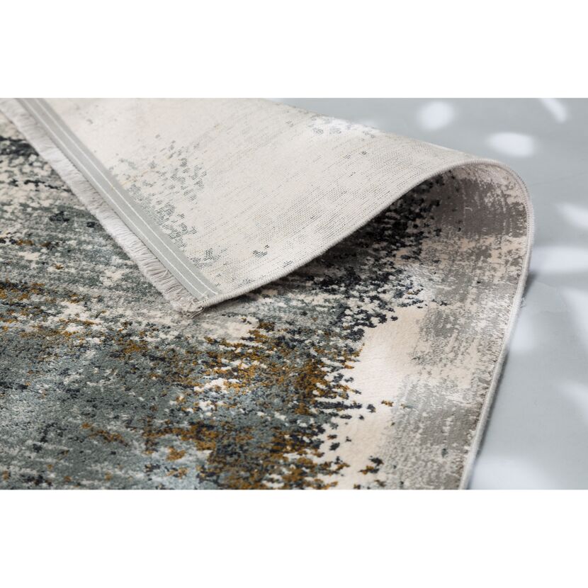 Gepunkteter Teppich in Grau und Beige