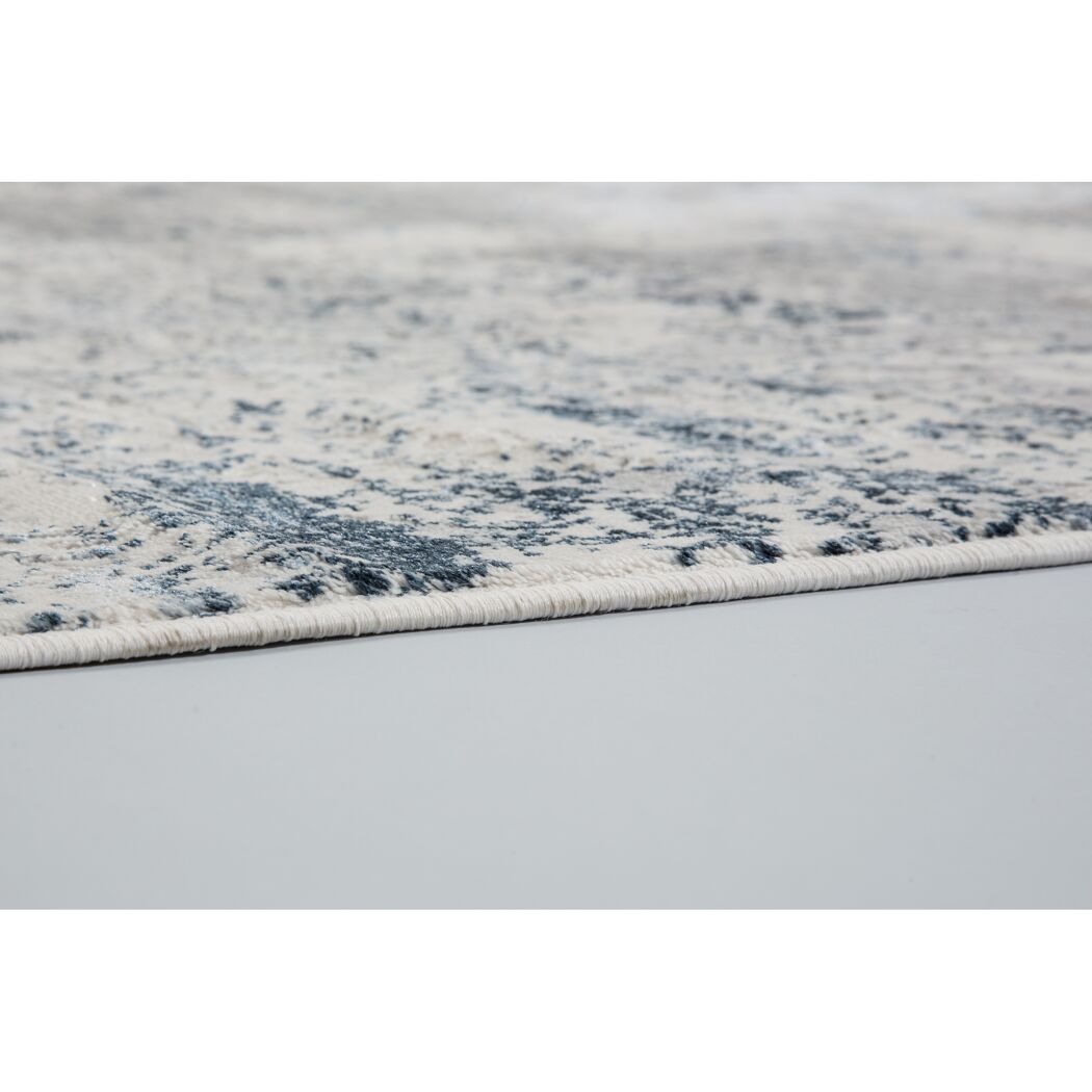 Blauer und weißer Teppich
