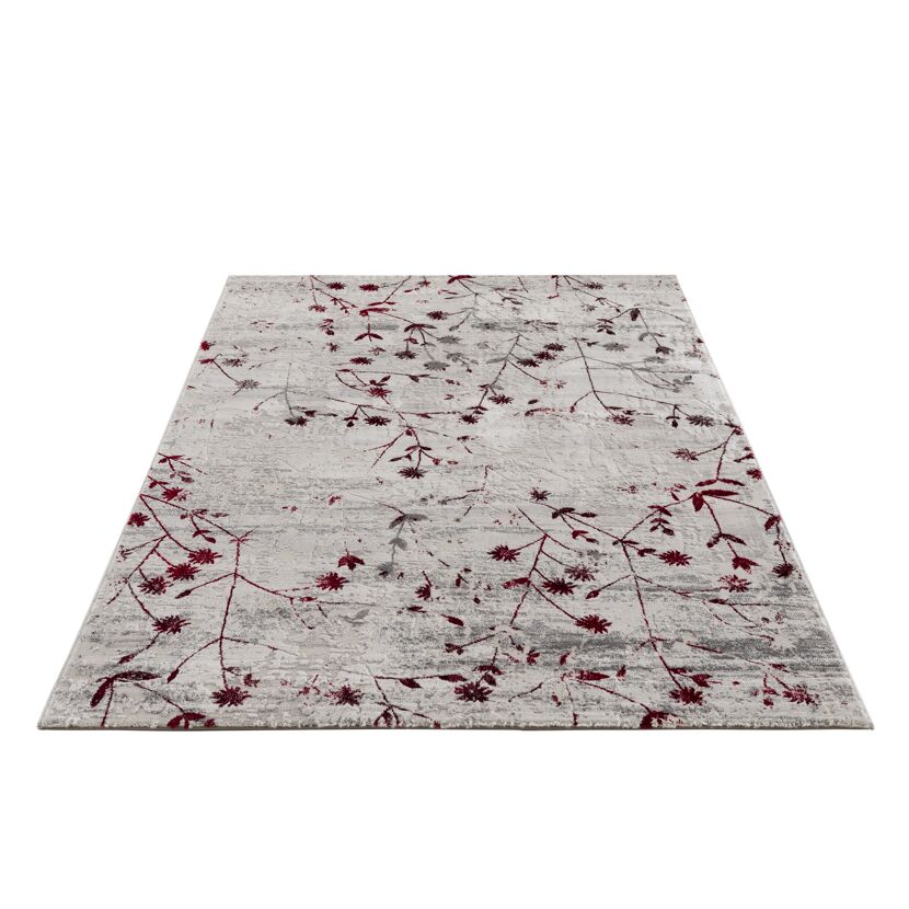 Beiger Teppich mit rotem Blumenmuster