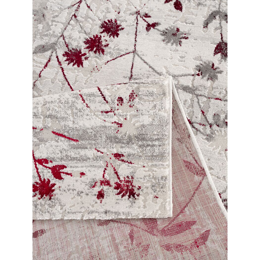 Beiger Teppich mit rotem Blumenmuster