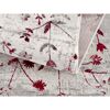 Beiger Teppich mit rotem Blumenmuster