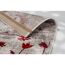 Ecke eines Teppichs mit rotem Blumenmuster