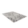 Beiger Teppich mit schwarzem Blumenmuster