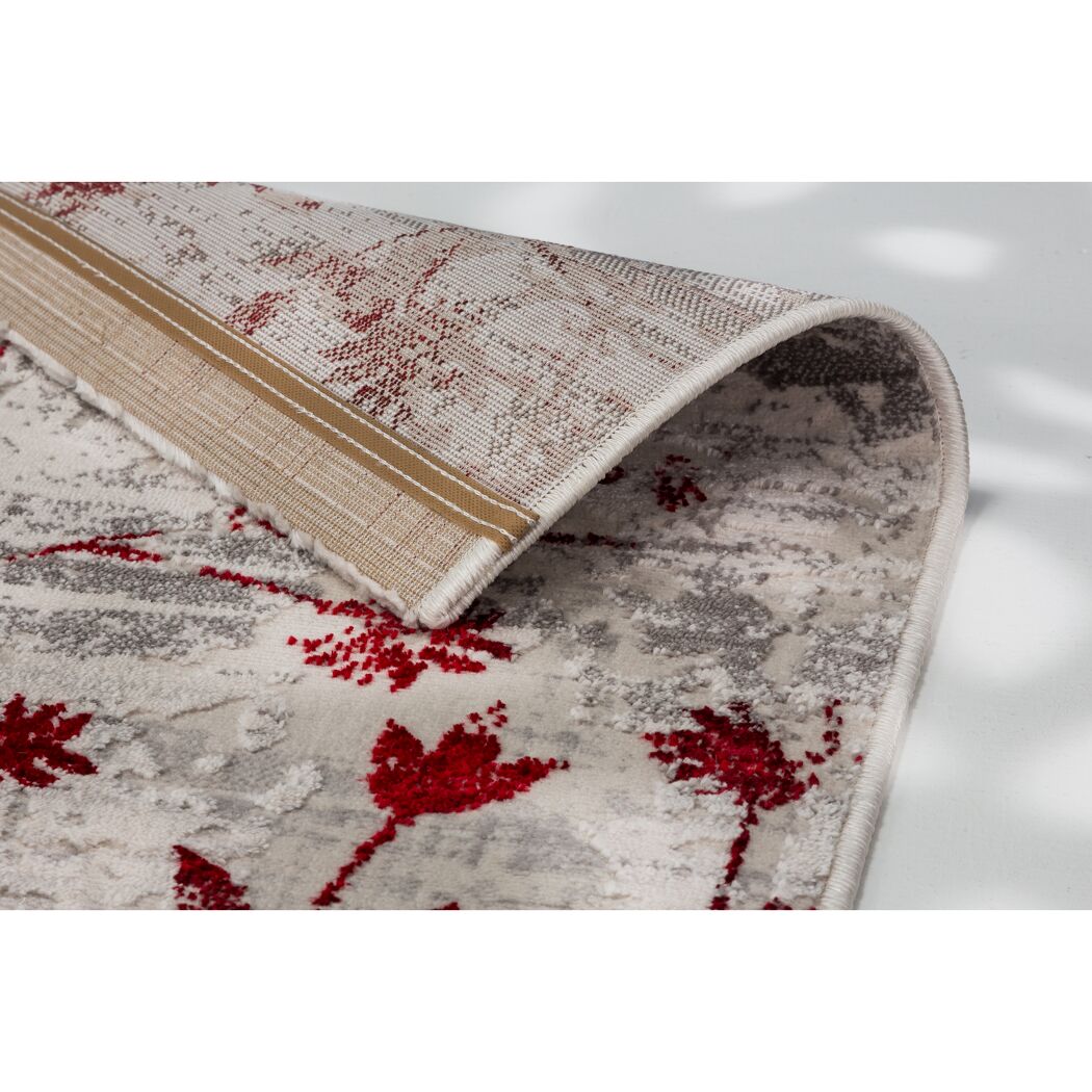 Beiger Teppich mit rotem Blumenmuster