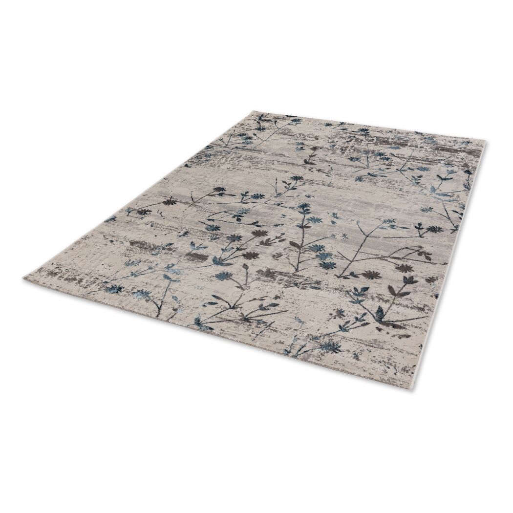 Beiger Teppich mit floralem Muster in Blau und Grau