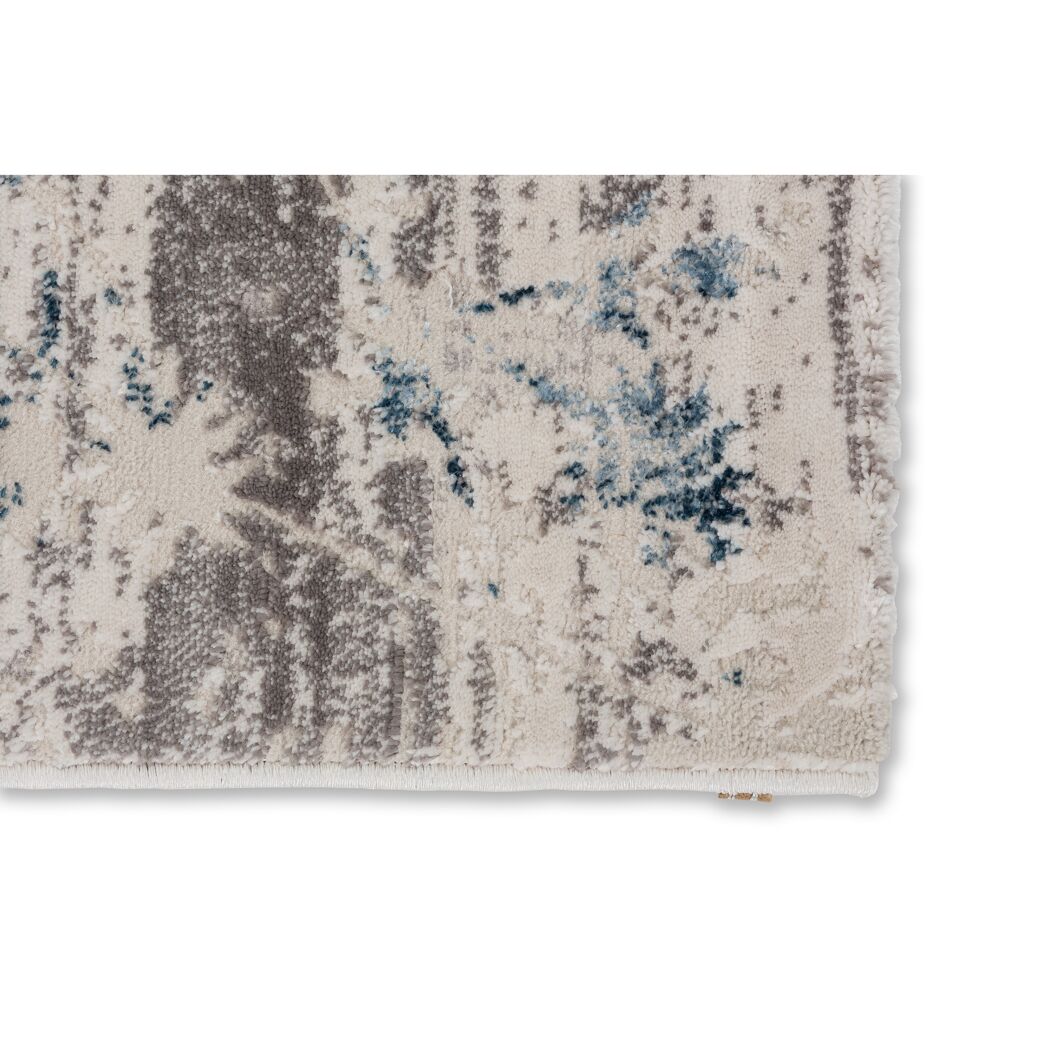 Beigefarbener Teppich mit blauem und grauem Muster