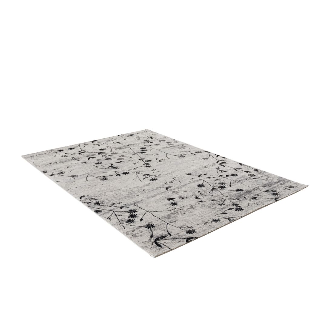 Beiger Teppich mit schwarzem Blumenmuster