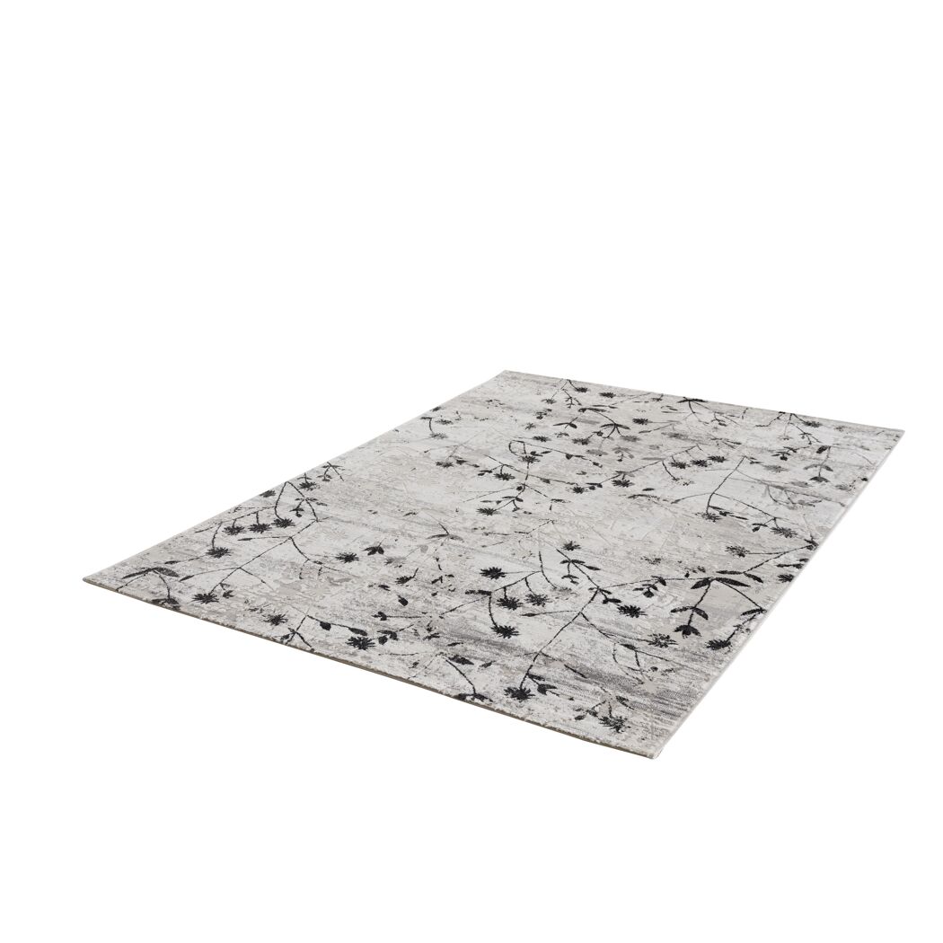 Beiger Teppich mit schwarzem Blumenmuster