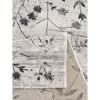 Beiger Teppich mit schwarzem Blumenmuster